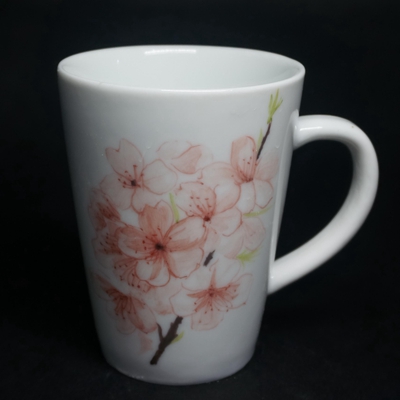廿釉白瓷桃花杯